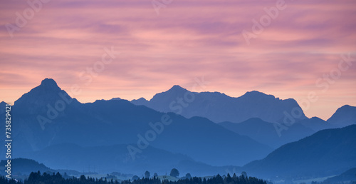 Mountains at sunset in Allgovia, Germany.. photo