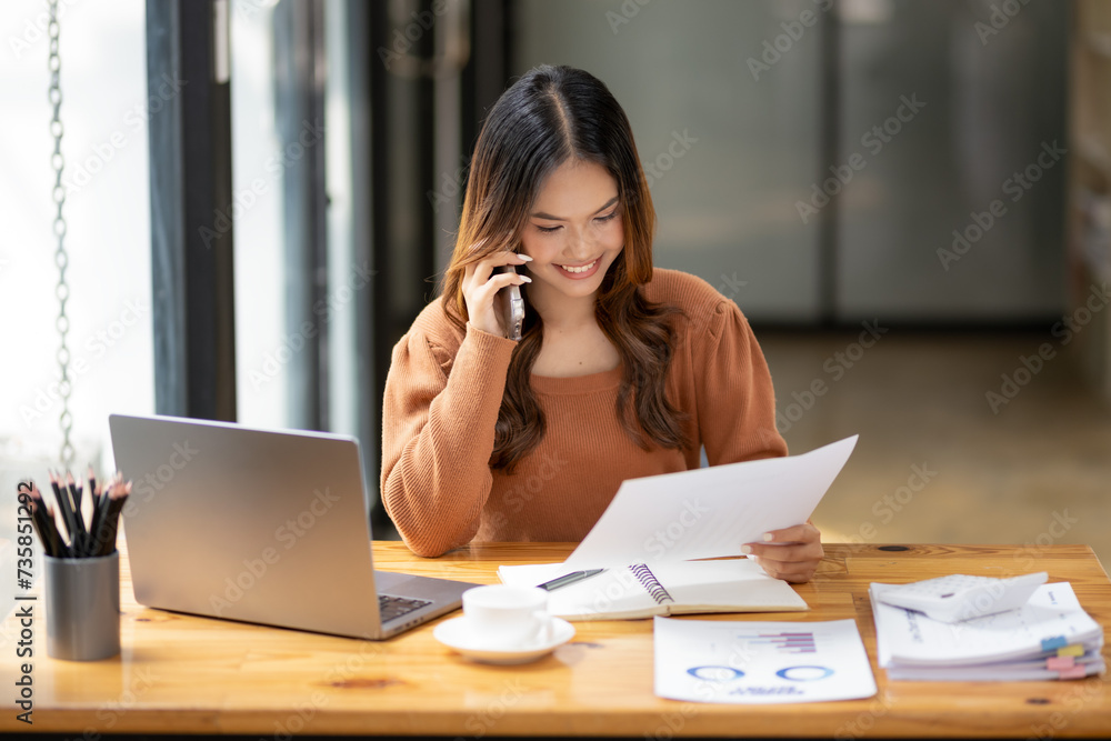 businesswoman talking on a mobile phone businesswoman talking on a mobile phone