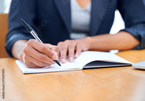 Hands, business and writing in book closeup, agenda and information in office. Journal, notes and fingers of professional secretary at desk with pen for reminder, schedule and planning project ideas
