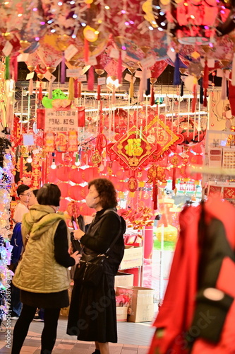 Taipei, Taiwan - Feb 01, 2024: During CNY, families hang Spring Festival couplets. These couplets carry auspicious messages, symbolizing hopeful expectations and blessings for the upcoming year.