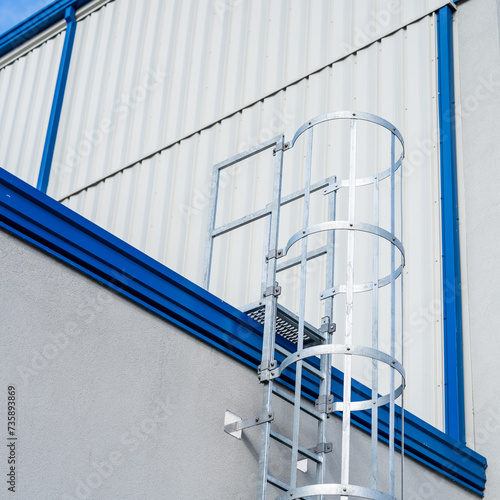 vertical aluminum escape ladder  entrance to the roof