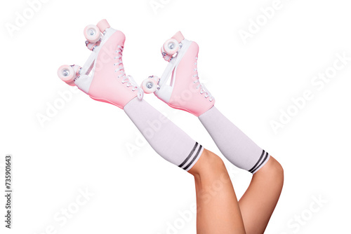 Foto Close up crop photo of  legs in vintage quad roller skates shoes isolated on pin