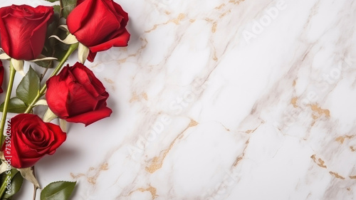 composition of a bouquet of red roses flowers, top view with copy space on a light golden marble surface