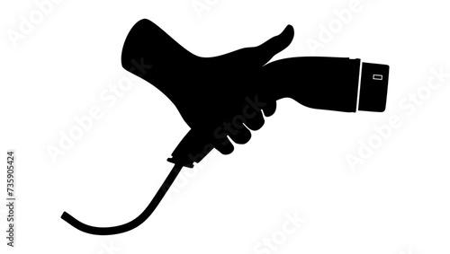 electric charger in hand, black isolated silhouette