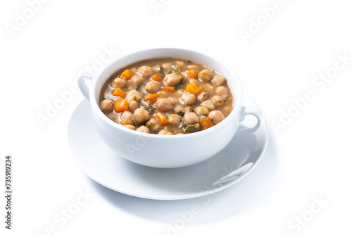 Chickpeas soup with vegetables in bowl isolated on white background