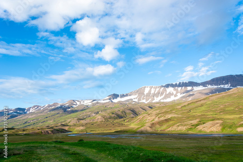mountain landscape in summer, iceland endles horizon, grenn meadows on moutains on summer time