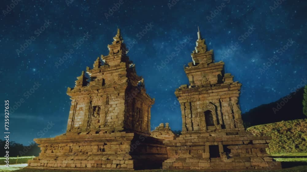 Gedongsongo Temple at night with starry sky and milky way galaxy. Seamless looping 4k video. Gedongsongo Temple at night with starry sky and milky way galaxy. Seamless looping 4k video.