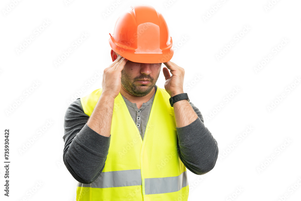 Male constructor touching temples migraine stressed concept Male constructor touching temples migraine stressed concept