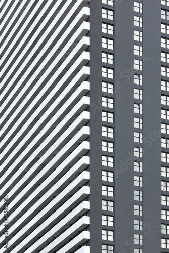 Obraz na płótnie Minimalistic photo of a part of a modern grey and white apartment building w salonie