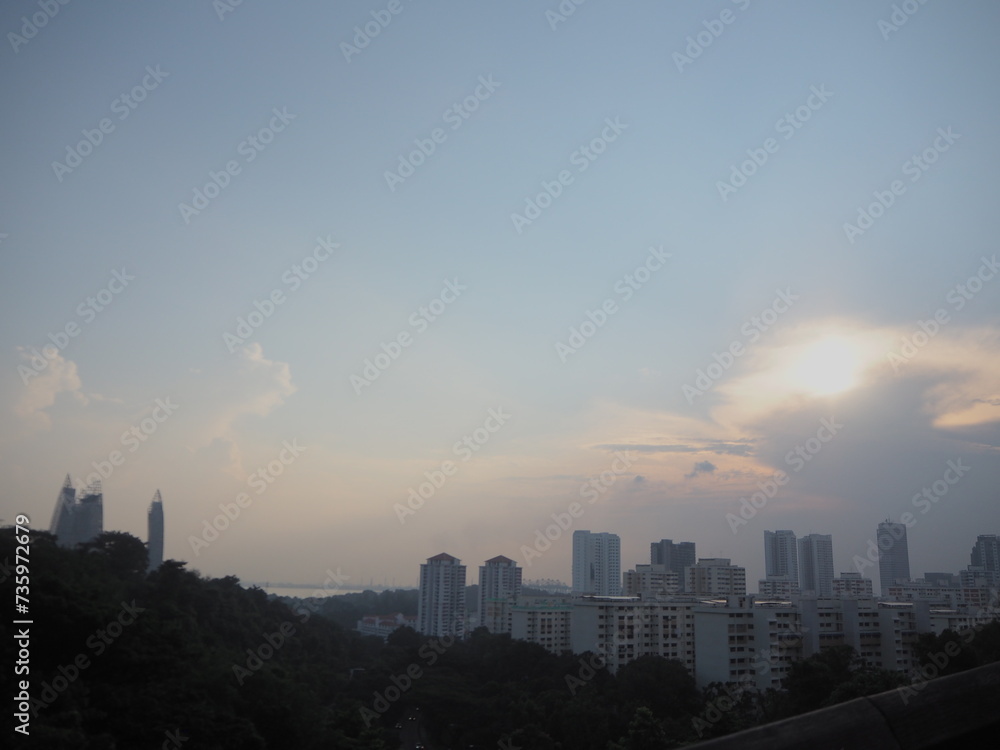 Fototapeta premium city skyline at sunset and clounds