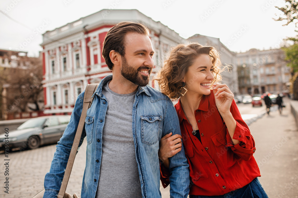 man and woman on romantic vacation walking together man and woman on romantic vacation walking together