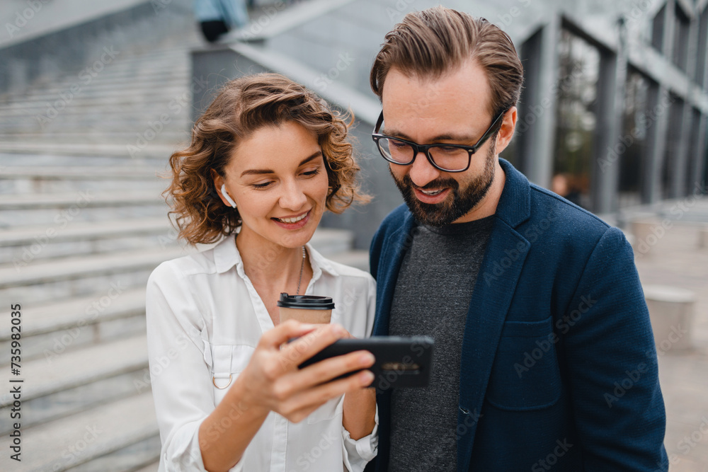 man and woman business partners working together man and woman business partners working together
