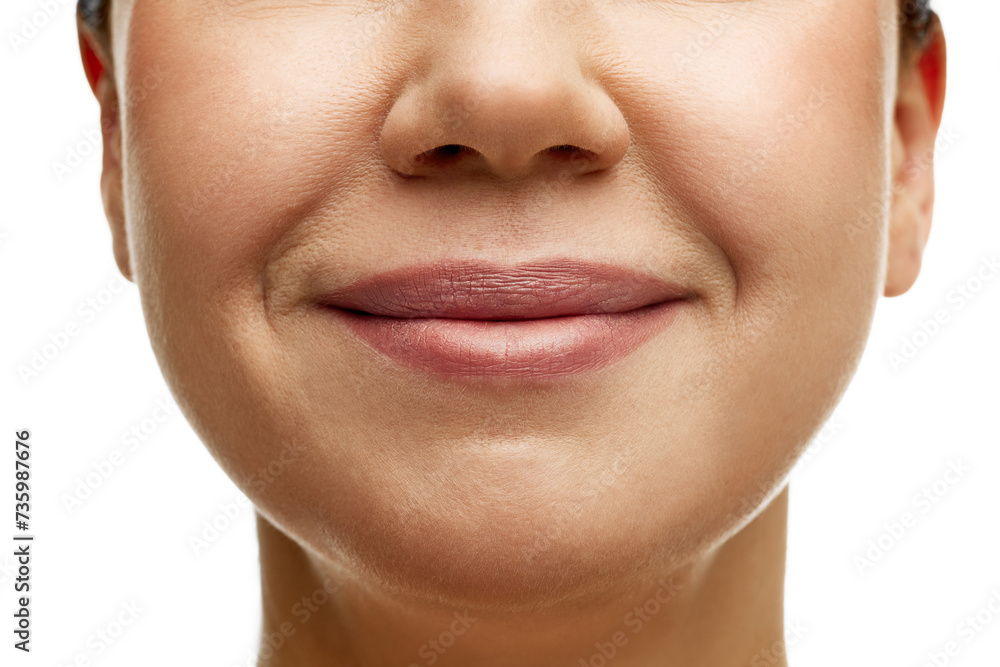 Obraz premium Cropped portrait of middle-aged woman with full moisturized pink lips and well-kept skin. Model smiling. Prevention of nasolabial folds. Concept of beauty, spa, cosmetology, skincare, anti-aging.