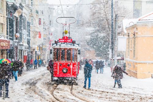 Istanbul, Turkey, 15 February 2021; Winter and Red Tram in Istiklal Street, Beyoglu, Istanbul.