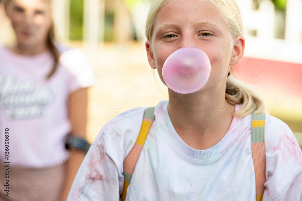 Young girl with bubble gum, blowing bubbles Young girl with bubble gum, blowing bubbles