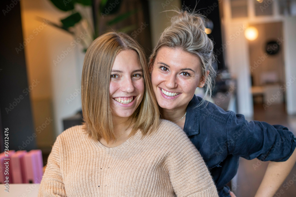 Attractive blonde friends posing for a portrait Attractive blonde friends posing for a portrait
