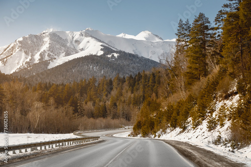 Country road in winter mountains