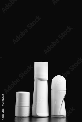 Set of roll-on antiperspirants deodorants, isolated on black background, packaging mockups for personal care products