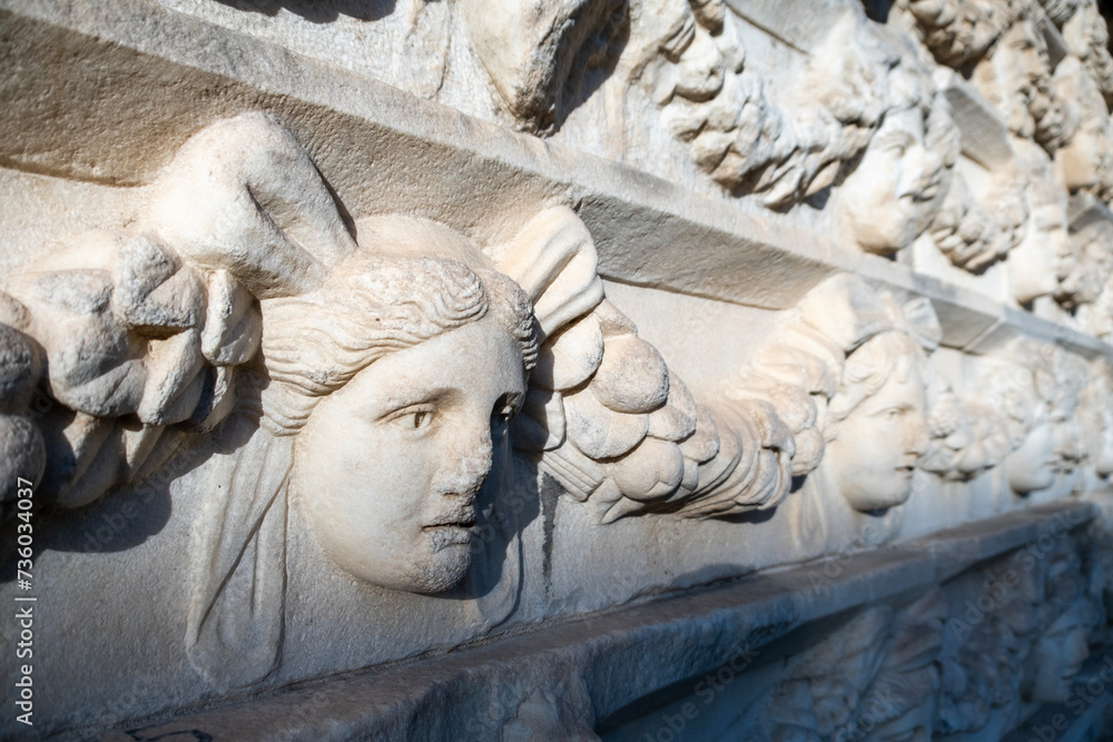 Ancient statues on the walls of the ancient city of Aphrodisias