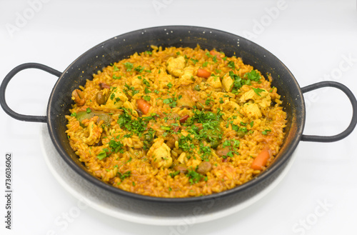 A typical Valencian seafood paella with rice
