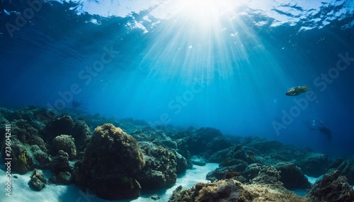 underwater ocean blue abyss with sunlight diving and scuba background