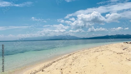 The beauty of the blue sea on Tabuhan Island in the Bali Strait, Indonesia. photo