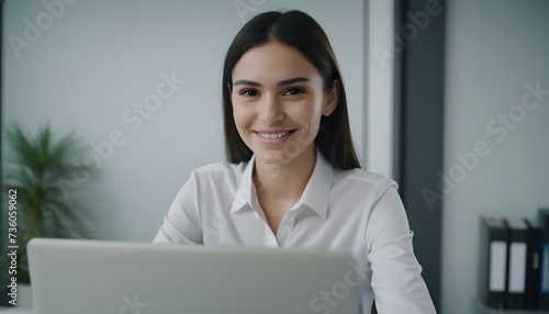  businesswoman, wearing suit using laptop working in office