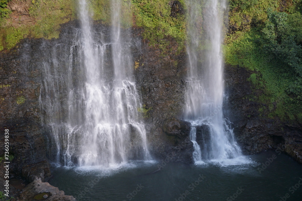 A beautiful waterfall in the midst of perfect nature in the forest. A beautiful waterfall in the midst of perfect nature in the forest.