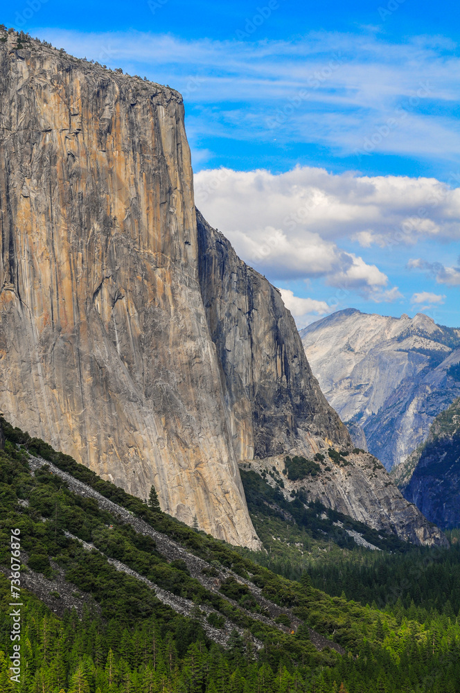 Late summer view of Yosemite Valley and the sheer rock face of El Capitan from Tunnel view, Yosemite National Park, California, USA.