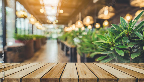 Wood table top on blurred interior blurred people meeting in coffee shop cafe co-working space Ready used us display or montage products design