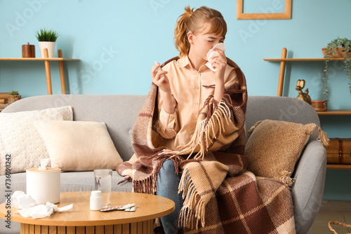 Ill young woman with nasal ...