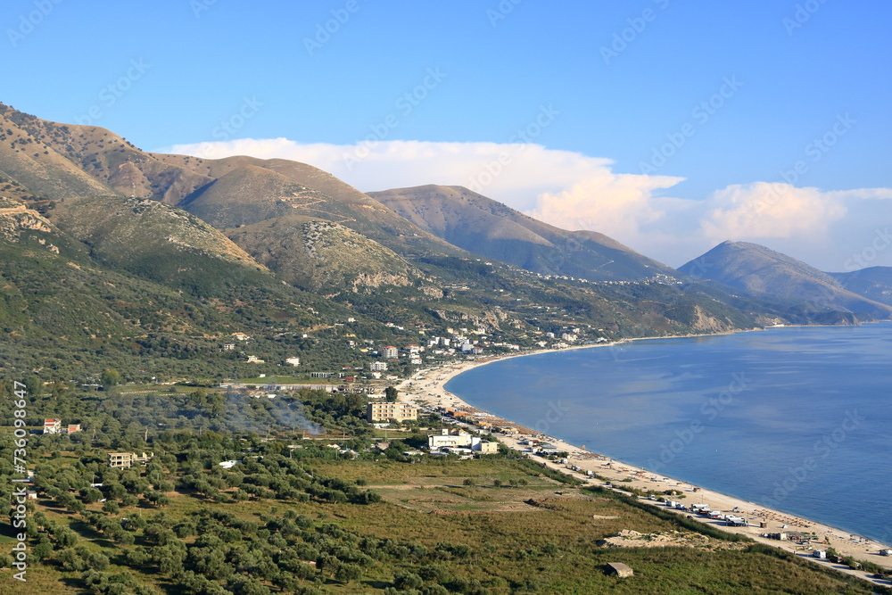 Aerial view of Borshit beach. Qazim Pali cityscape. Colorful seascape of Adriatic sea, Albania