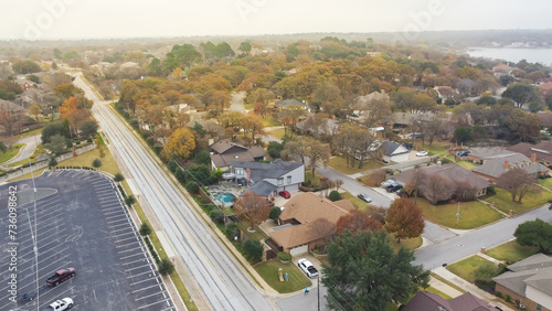 Quiet local street with outdoor parking lakeside residential neighborhood, upscale subdivision homes swimming pool, large backyard, tall matured trees in Arlington, Dallas–Fort Worth metroplex photo