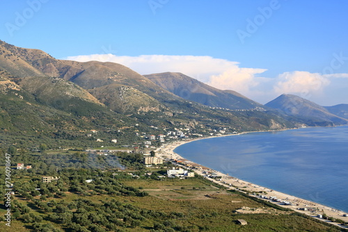 Aerial view of Borshit beach. Qazim Pali cityscape. Colorful seascape of Adriatic sea, Albania