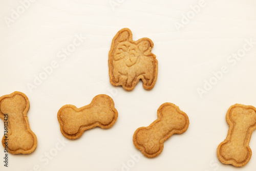 Bulldog cookies and bone biscuits on the table. Copy space