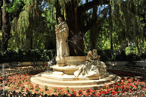 Monument dedicated of the famous romantic spanish poet Gustavo Adolfo Becquer in the Maria Luisa Park, Seville, Spain photo