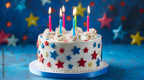 Birthday Cake With Lit Candles on Blue Table