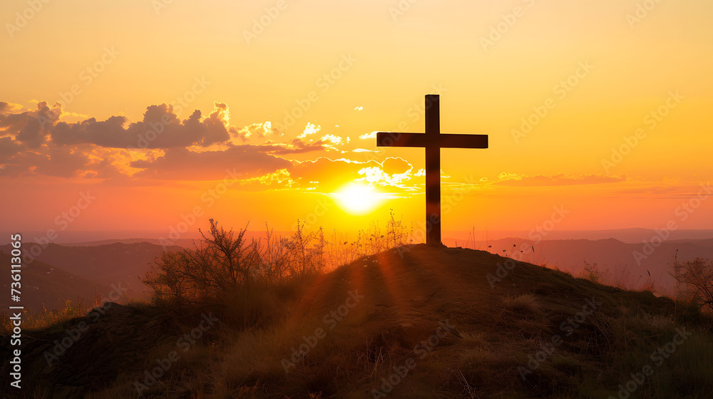Cross Atop Hill at Sunset