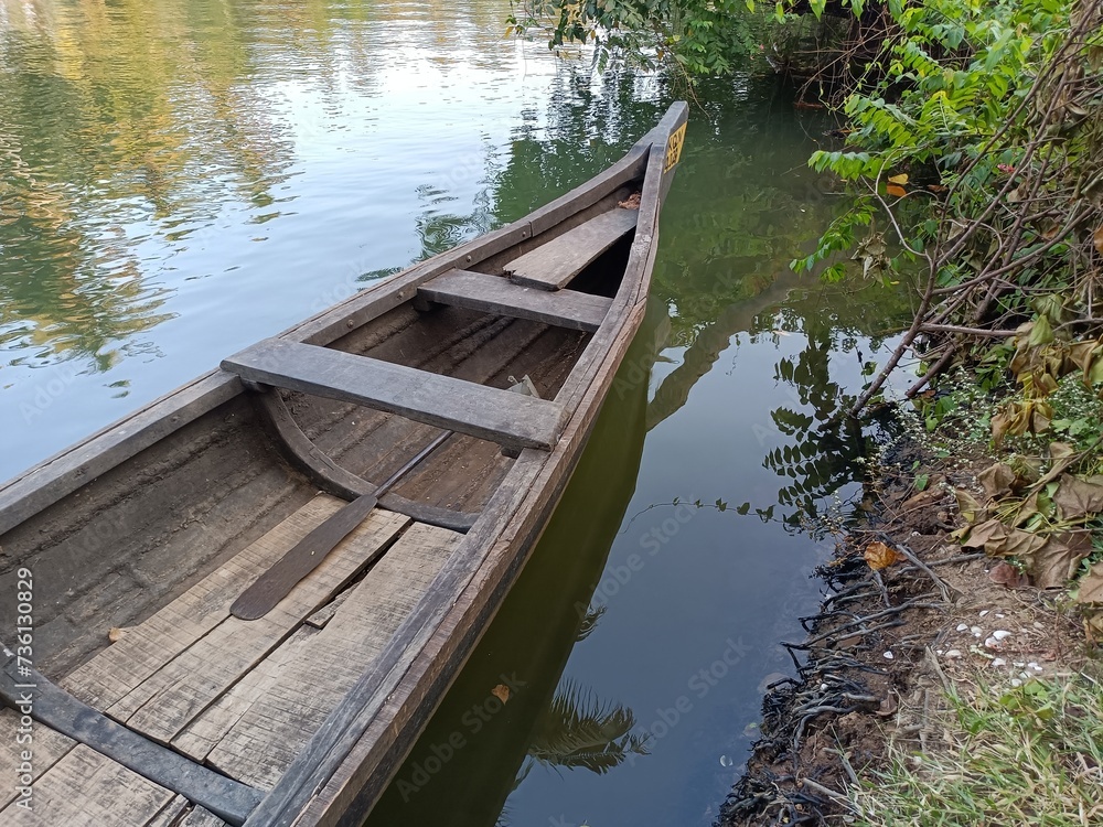 A wooden vehicle used for water transport is usually called a canoe.
A wooden vehicle used for water transport is usually called a canoe.