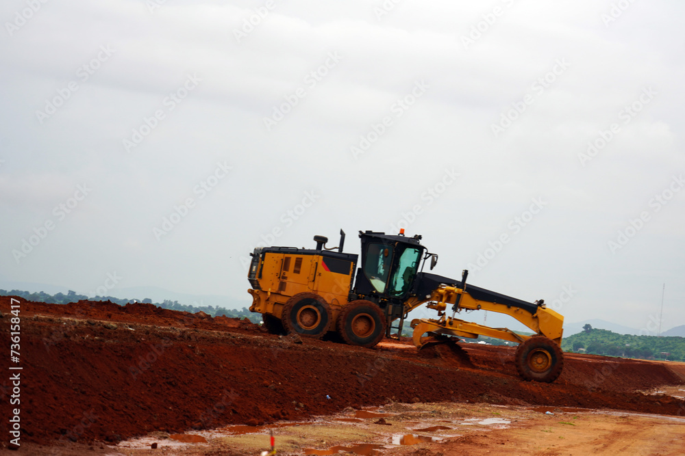 construction machines at works, dozer, roller machine, excavator, crawler rock drill machine, trucks, GPS grader construction machines at works, dozer, roller machine, excavator, crawler rock drill machine, trucks, GPS grader