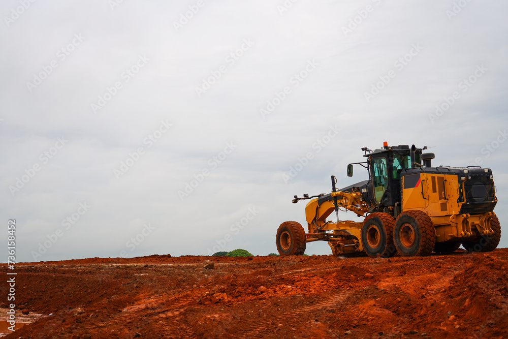 construction machines at works, dozer, roller machine, excavator, crawler rock drill machine, trucks, GPS grader