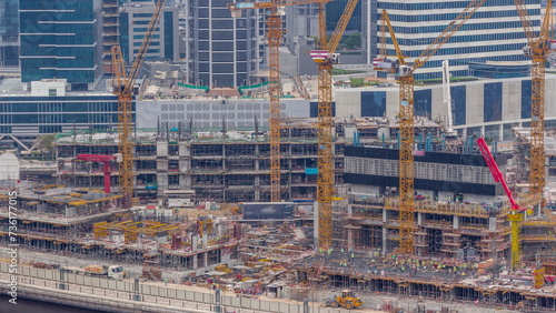 Wallpaper Mural Large construction site with many working cranes timelapse. Torontodigital.ca