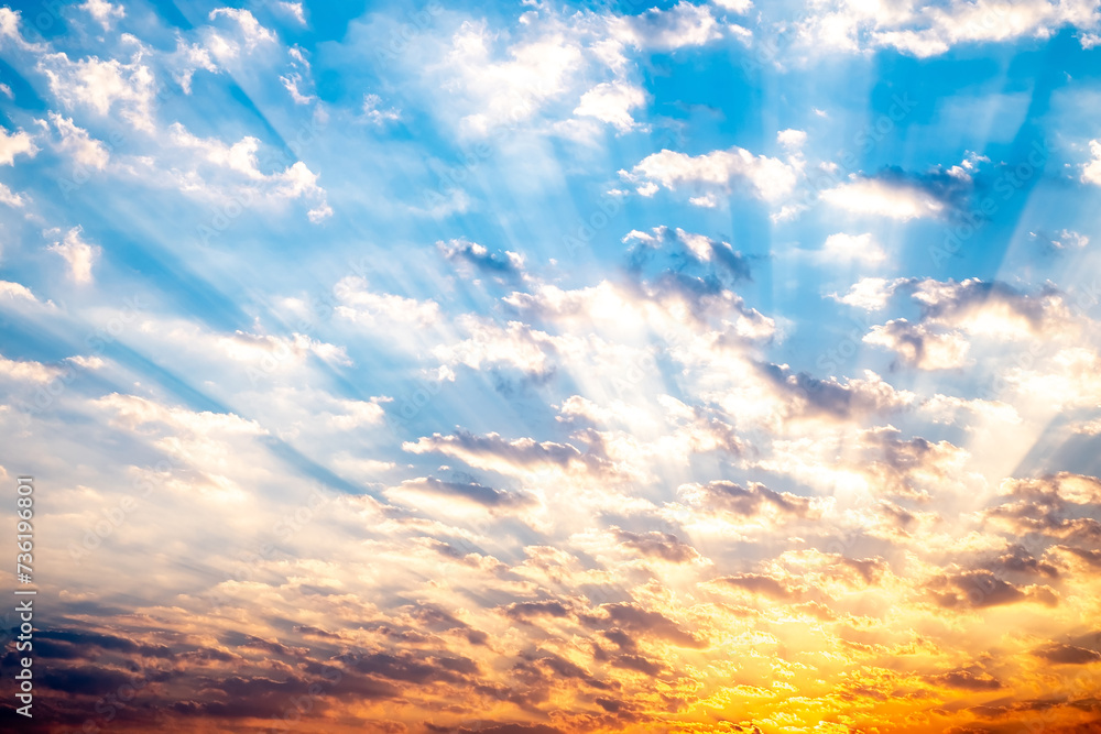 Obraz premium Sky, sunrise, sunset, luxury soft gradient orange gold clouds and gold sunlight between group of blue clound sky perfect for the background, take in everning,Twilight, high definition landscape photo