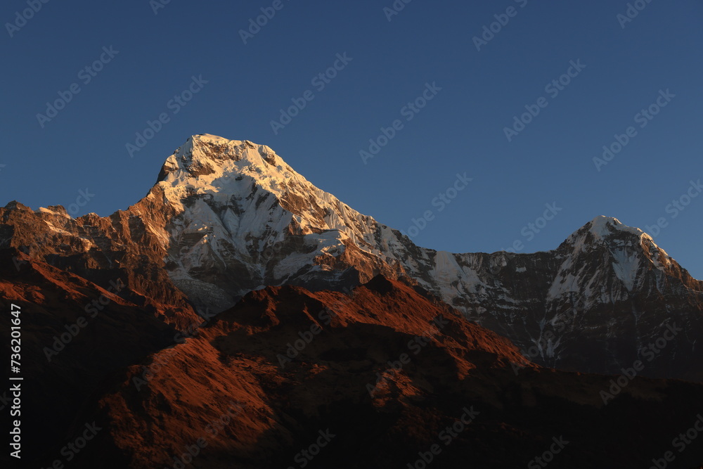 Annapurna South snow mountain in Nepal in day time, morning
