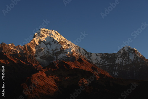 Annapurna South snow mountain in Nepal in day time, morning 