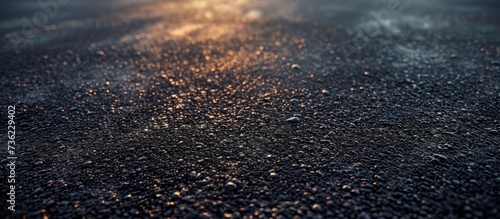 Detailed close up of a textured black asphalt surface in high resolution