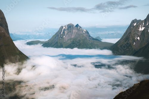 Aerial mountains view above clouds landscape in Norway travel Sunnmore Alps beautiful destinations summer season scandinavian nature morning scenery photo