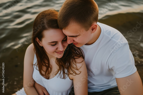 Soulful Connection: Young Lovers Embracing Waterside