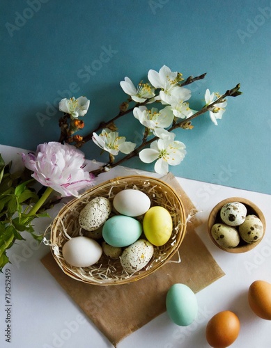 Easter eggs and flowers with blue background