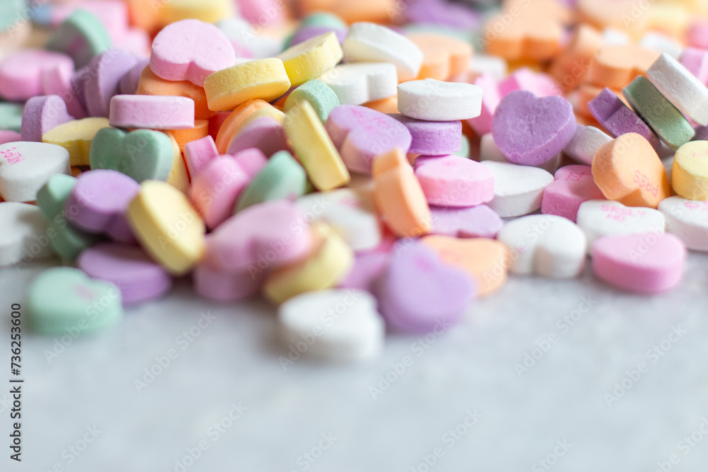 Colorful valentine heart candy with February 14th on blocks Colorful valentine heart candy with February 14th on blocks